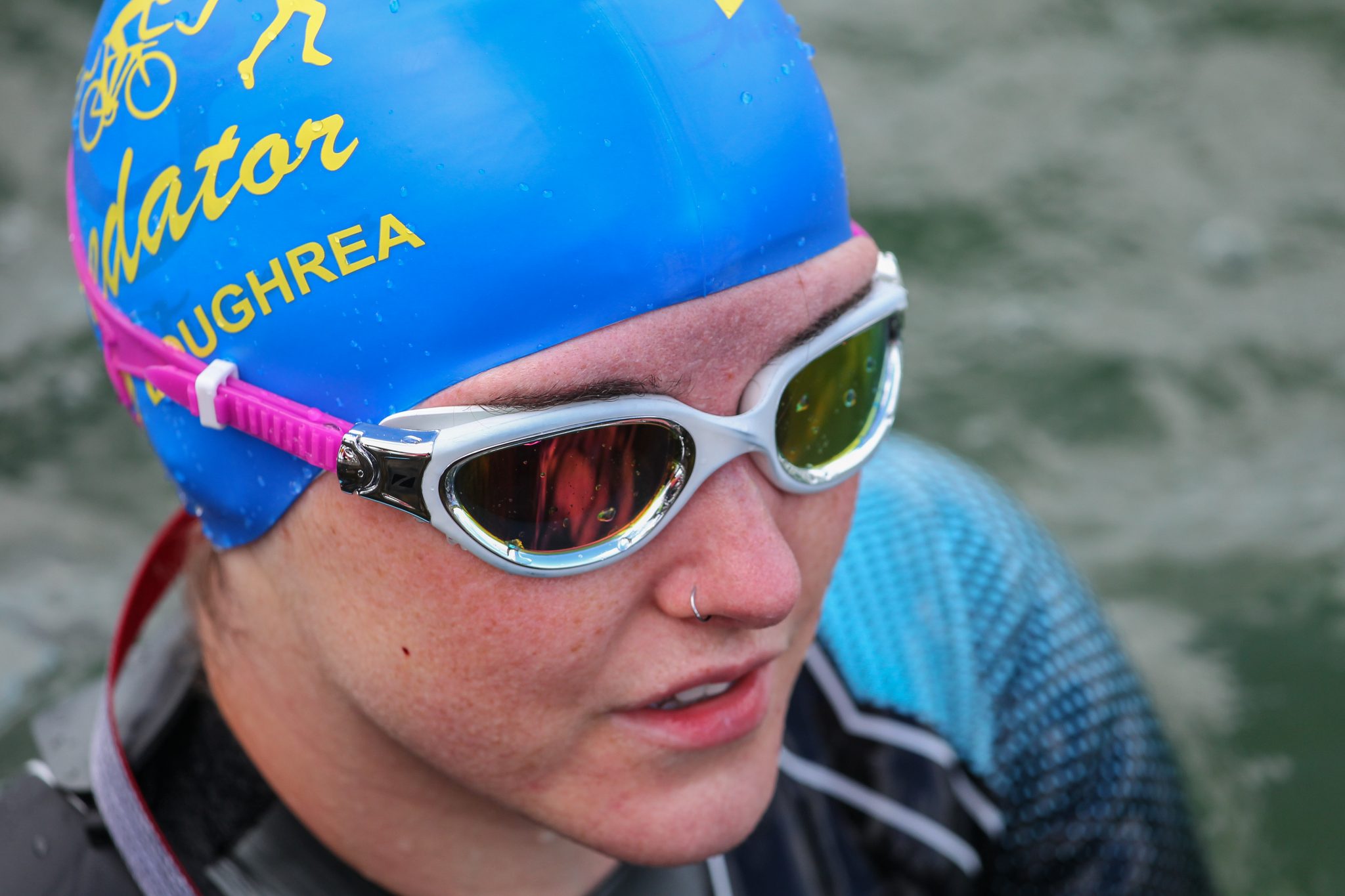 swimmer with blue swim cap